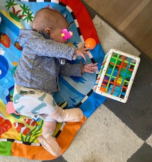 Sensory balls to encourage baby to roll