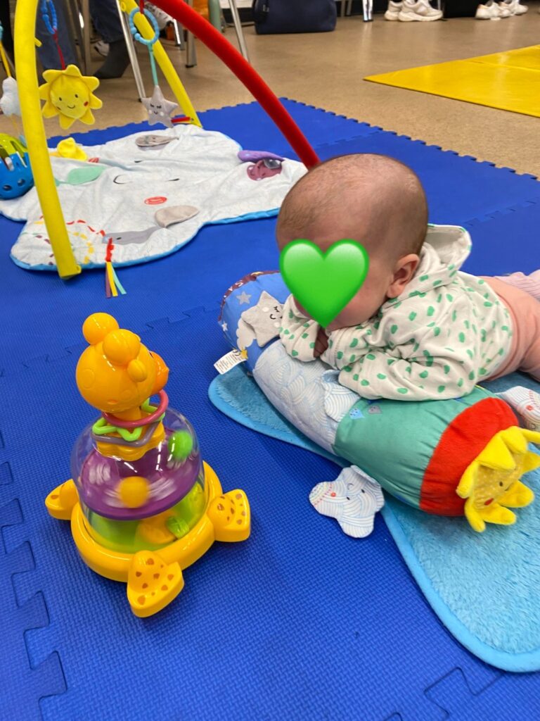 Spinning toy for tummy time